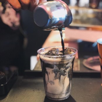 Melted Vinyl Coffee - The emo latte as it's being prepared, mixes into this awesome charcoal color. I definitely recommend giving it a try - Coffee & Tea Near Me - Brea, California Melted Vinyl Coffee - The emo latte as it's being prepared, mixes into this awesome charcoal color. I definitely recommend giving it a try - Coffee & Tea Near Me - Brea, California