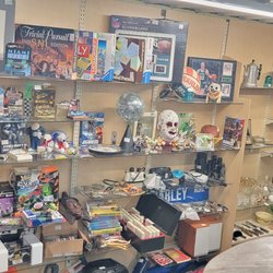 Silver Moon Antique Mall - Star wars baby Yoda, Harley sign and ECT