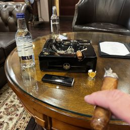 Enjoying a store bought cigar in the lounge.