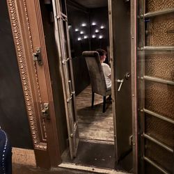 The Saint - Valut doors going to small private seating