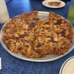 Leon's Pizza - Large pizza with pepperoni, sausage and Canadian bacon
