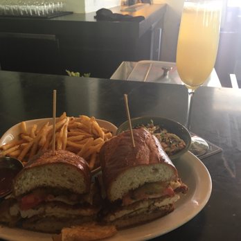 Down On Grayson - Crispy Chicken Sandwich with Mimosa - New American Near Me - San Antonio, Texas Down On Grayson - Crispy Chicken Sandwich with Mimosa - New American Near Me - San Antonio, Texas