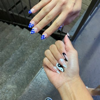 Red Polish - Top by Uka, bottom by Menoire - Nail Salons Near Me - Los Angeles, California