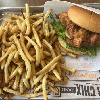 Super Chix - The Deluxe sandwich with regular sized rosemary pepper seasoned fries - Chicken Shop Near Me - Fort Mill, South Carolina Super Chix - The Deluxe sandwich with regular sized rosemary pepper seasoned fries - Chicken Shop Near Me - Fort Mill, South Carolina