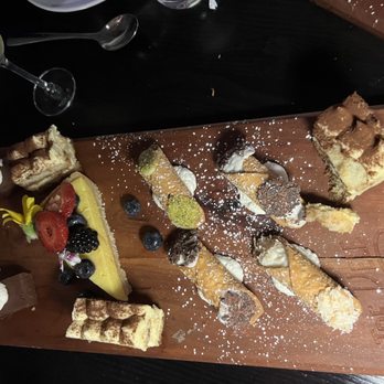 Tre Vele - The amazing dessert platter ~ cannolis, lemon ricotta cheesecake, tiramisu, chocolate torte! - Italian Near Me - Sandy Springs, Georgia Tre Vele - The amazing dessert platter ~ cannolis, lemon ricotta cheesecake, tiramisu, chocolate torte! - Italian Near Me - Sandy Springs, Georgia