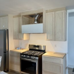 Main wall (custom cabinet / panel for range hood not seen in this picture. To be installed soon).