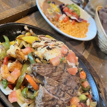Miguel's Cocina - Combination Fajitas Steak, shrimp, shrimp - Mexican Near Me - Carlsbad, California Miguel's Cocina - Combination Fajitas Steak, shrimp, shrimp - Mexican Near Me - Carlsbad, California