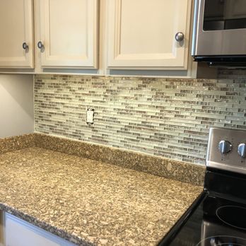 Francisco's Contracting - a kitchen with a granite countertop - General Contractors Near Me Francisco's Contracting - a kitchen with a granite countertop - General Contractors Near Me
