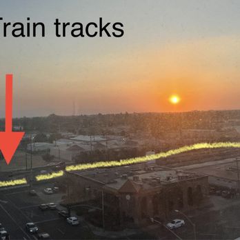 DoubleTree by Hilton Hotel Modesto - Parallel train tracks by the parking structure and businesses - Hotels Near Me - Modesto, California DoubleTree by Hilton Hotel Modesto - Parallel train tracks by the parking structure and businesses - Hotels Near Me - Modesto, California