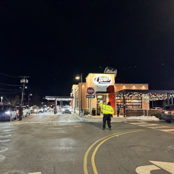 Raising Cane's Chicken Fingers - Security directing traffic. - Fast Food Near Me - Marlton, New Jersey Raising Cane's Chicken Fingers - Security directing traffic. - Fast Food Near Me - Marlton, New Jersey