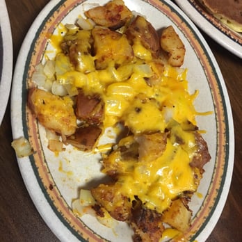 Chuck Wagon Restaurant - Home style potatoes with cheese and onions ! - American Near Me - Miami, Florida