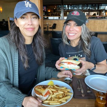 Nick's Seafood Restaurant - My daughter and I sharing the famous crab sandwich - Seafood Near Me - Pacifica, California Nick's Seafood Restaurant - My daughter and I sharing the famous crab sandwich - Seafood Near Me - Pacifica, California