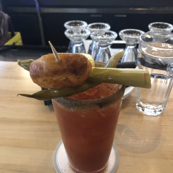 Eddie Burger + Bar - Signature Caesar (pickled green bean, asparagus spear & onion ring) - Burgers Near Me - Banff, Alberta Eddie Burger + Bar - Signature Caesar (pickled green bean, asparagus spear & onion ring) - Burgers Near Me - Banff, Alberta