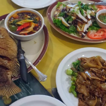 Thai Flavor - Whole fried tilapia and we asked for sauce on the side, whole grilled squid, beef pad si yew - Thai Near Me - Aurora, Colorado Thai Flavor - Whole fried tilapia and we asked for sauce on the side, whole grilled squid, beef pad si yew - Thai Near Me - Aurora, Colorado