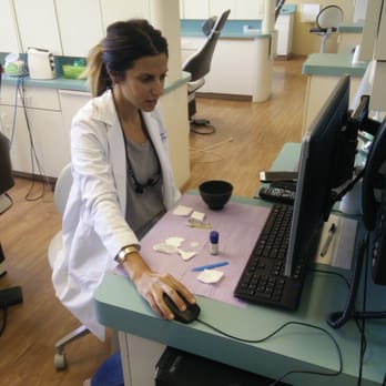 Goli Javaher, DDS - Checking x-rays before I start! - Cosmetic Dentists Near Me - Los Angeles, California