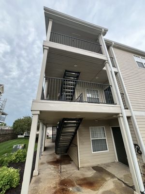 Apartment rebuild and repairs - Old rotted decks stairs 8months out had to frame the landing to specific heights to make the new metal staircase work. Expert framers in place safety first priority.