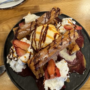 Parrando’s Tex-Mex Grill - Churro dessert plate with vanilla ice cream, fresh strawberries and whipped cream - Tex-Mex Near Me - Haymarket, Virginia Parrando’s Tex-Mex Grill - Churro dessert plate with vanilla ice cream, fresh strawberries and whipped cream - Tex-Mex Near Me - Haymarket, Virginia
