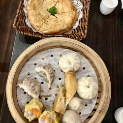 Ma's Kitchen Next Door - Dim sum platter with a variety that's in the menu & scallion pancakes in the back