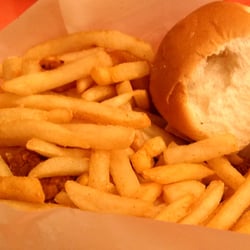 Louisiana chicken buried under a heap of fries