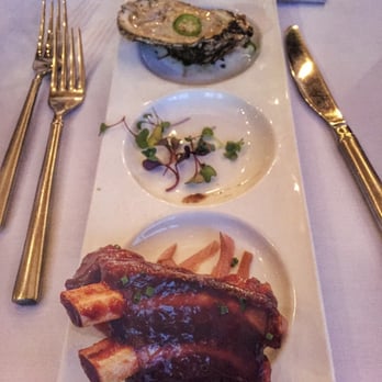 Queenie's Steakhouse - Top: grilled oyster Bottom: boar ribs - Steakhouses Near Me - Denton, Texas Queenie's Steakhouse - Top: grilled oyster Bottom: boar ribs - Steakhouses Near Me - Denton, Texas