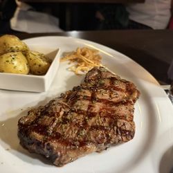Holstein Grill Steak House - New York strip steak and roasted potatoes
