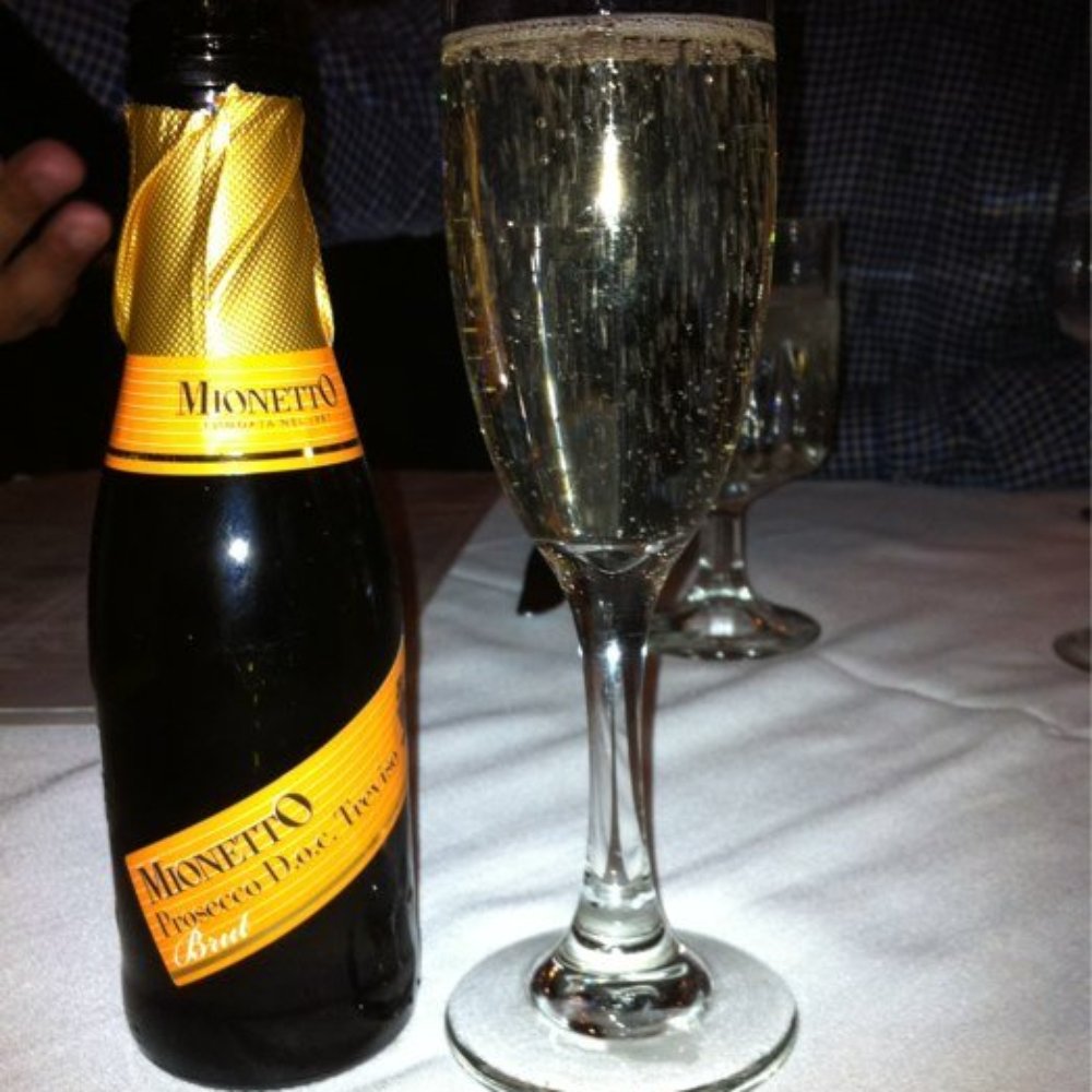 Carmine's - My glass of prosecco - Italian Near Me - Chicago, Illinois