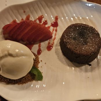 Élyse Restaurant - Dark chocolate lava cake with raspberry coulis - French Near Me - San Jose, California