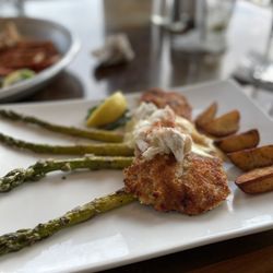 Jourdan River Steamer - Potato encrusted fish with asparagus, potatoes and topped with crab and hollandaise sauce