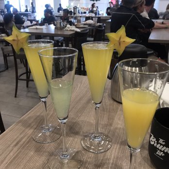 Hash Kitchen - Passion fruit, kiwi and orange mimosas. $6 - Breakfast & Brunch Near Me - Scottsdale, Arizona
