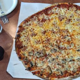 This was a very good thin crust pizza that worked well for 2 people and was cut in a way I've not really seen before