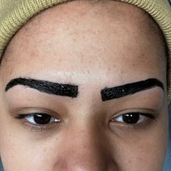 Bollywood Eyebrows - The eyebrow on the right way is way lower.