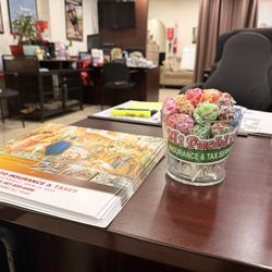Mi Pueblo Insurance - Free candy and calendars year round