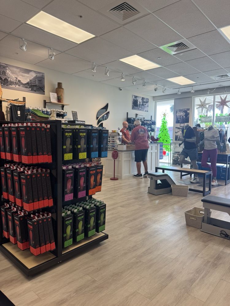 Fleet Feet - The Villages Logo