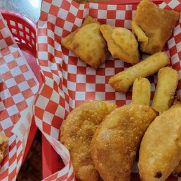 two baskets of fried food two baskets of fried food