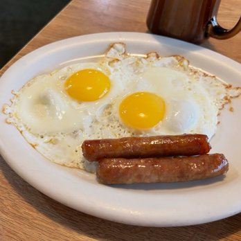 Zeke's Eatin' Place - When I'm done with thinking, Then I'm done with you 2 x 2 x 2 plate (Wagon Wheel Pancakes (creamer for comparison), sausage, & eggs) - Breakfast & Brunch Near Me - Ontario, California Zeke's Eatin' Place - When I'm done with thinking, Then I'm done with you 2 x 2 x 2 plate (Wagon Wheel Pancakes (creamer for comparison), sausage, & eggs) - Breakfast & Brunch Near Me - Ontario, California