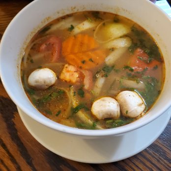 Thai House Cuisine - a bowl of soup on a table - Thai Near Me - Pleasant Grove, Utah Thai House Cuisine - a bowl of soup on a table - Thai Near Me - Pleasant Grove, Utah
