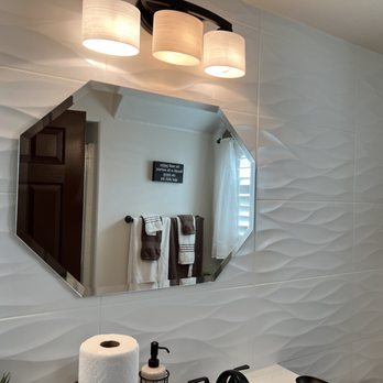 Jaramillo Tile - Finished Wall Tile installation with Mirror and Light installation - Flooring Near Me