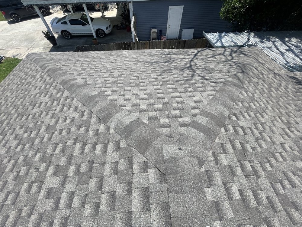 Slide of Dutchmark Roofing