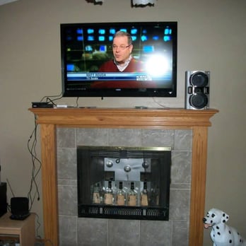 Keeler Construction - Ripped out old fireplace that was broken to convert it into an entertainment center - General Contractors Near Me - Wichita, Kansas