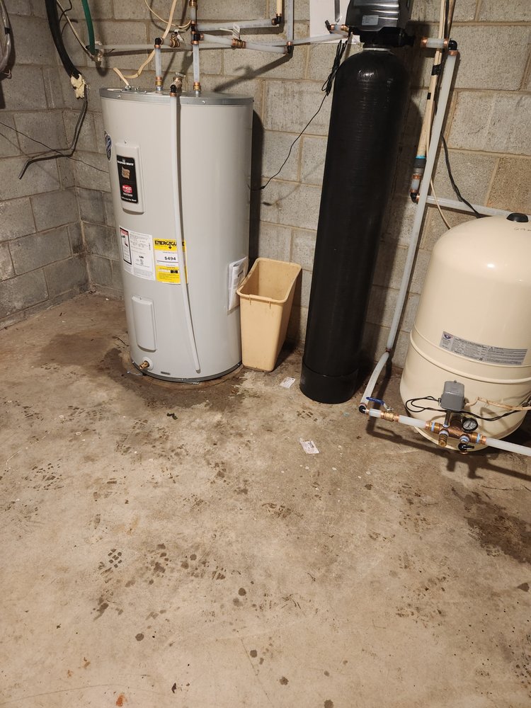 Slide of Holy Water Plumbing and Water Treatment