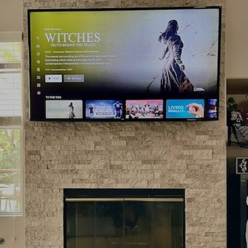 MVP - Mobile Video Plus - 65" TV along with the tv mount installed above the Fireplace. - Home Theatre Installation Near Me