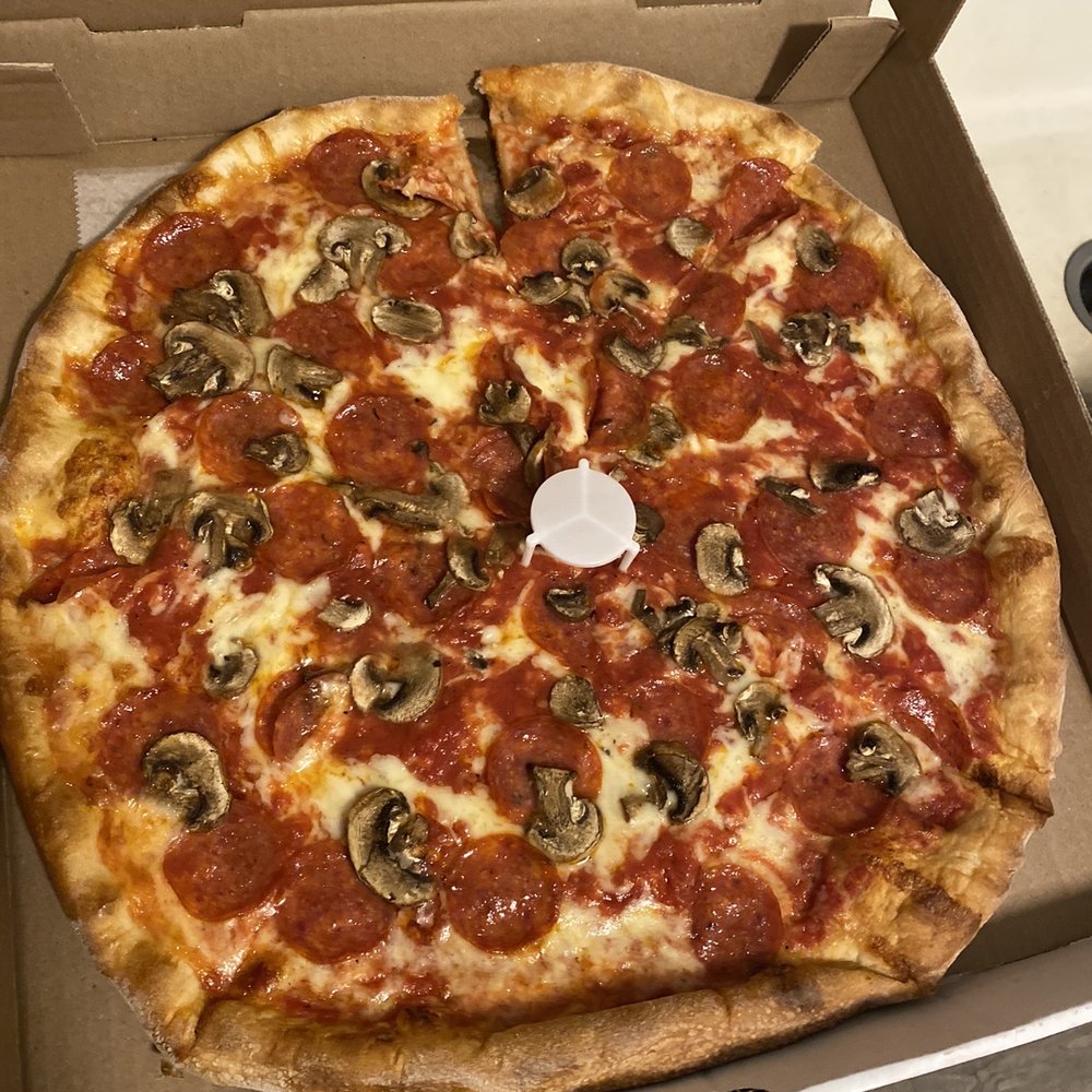 Pepperoni, mushroom, extra sauce.