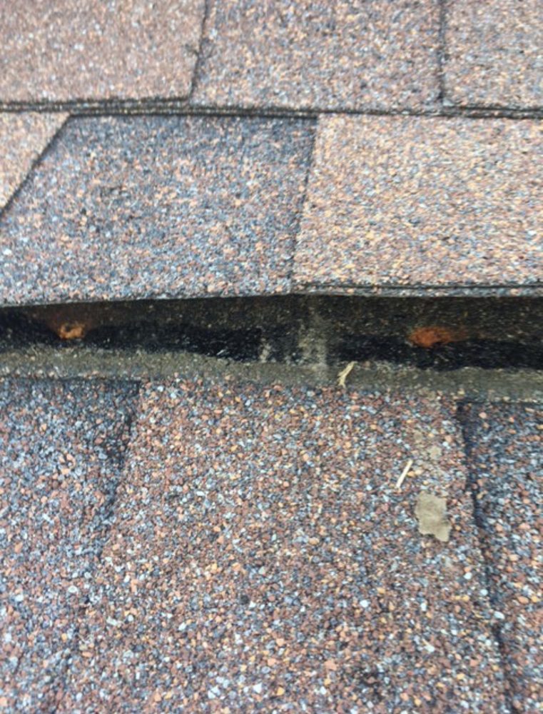 Slide of Roof Repair Company Near Me