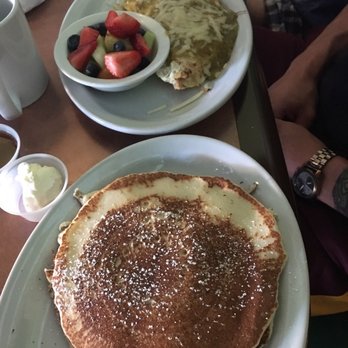 Sunnyside Breakfast Lounge - Green chili chicken omelette with a side of fruit and pancakes. - Breakfast & Brunch Near Me - Mesa, Arizona Sunnyside Breakfast Lounge - Green chili chicken omelette with a side of fruit and pancakes. - Breakfast & Brunch Near Me - Mesa, Arizona