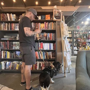 Sassafras on Sutton - My husband finding the perfect book with baby Ru reminiscing about his pup cup - Coffee & Tea Near Me - Black Mountain, North Carolina Sassafras on Sutton - My husband finding the perfect book with baby Ru reminiscing about his pup cup - Coffee & Tea Near Me - Black Mountain, North Carolina
