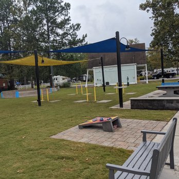 Virginia Beach KOA - Pocket Park Activity Area--cornhole, ladder golf, ping pong - Campgrounds Near Me - Virginia Beach, Virginia Virginia Beach KOA - Pocket Park Activity Area--cornhole, ladder golf, ping pong - Campgrounds Near Me - Virginia Beach, Virginia