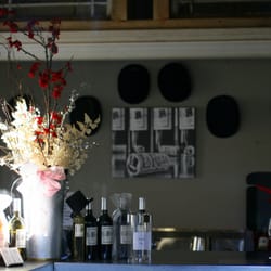 La Folia Winery - Wine room interior shot. Note the hats!