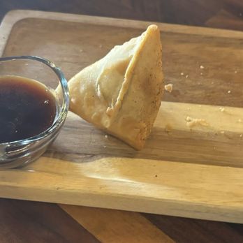 Maharaja Bistro & Cafe - The lonesome samosa (we ate the rest of them too quickly) - Indian Near Me - Lauderhill, Florida Maharaja Bistro & Cafe - The lonesome samosa (we ate the rest of them too quickly) - Indian Near Me - Lauderhill, Florida