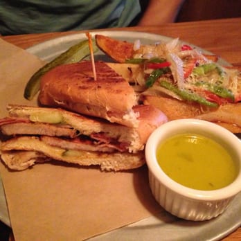 Ormsby's - Cubano sandwich with pork loin, ham, Swiss, provolone and mustard on a hoagie roll with fries and mojo sauce. - Sandwiches Near Me - Atlanta, Georgia