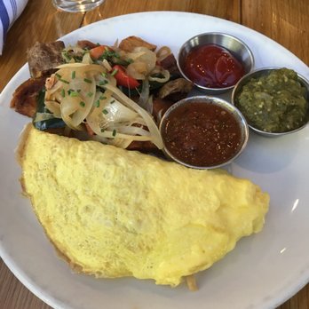 MESSHALL - Chilequles omelette..... PASS ON THIS. (Has no flavor unless you soak it with green/red sauce AND hardly any cheese or tortilla) - Breakfast & Brunch Near Me - Los Angeles, California